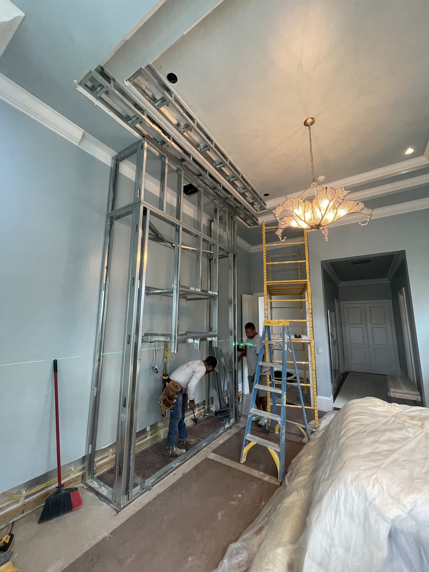 Framing a closet addition, steel stud by steel stud.