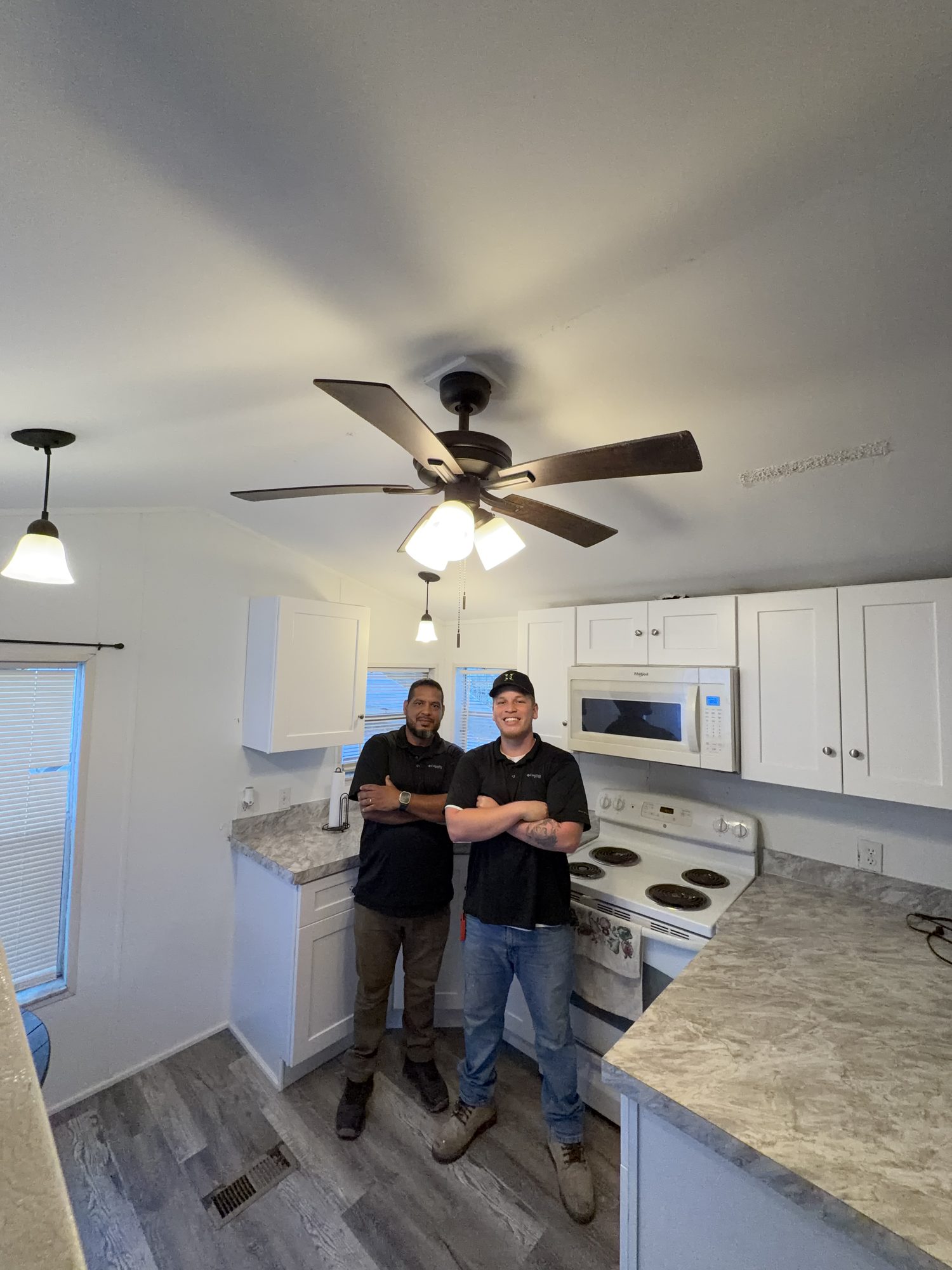 Walking a finished kitchen before handoff.